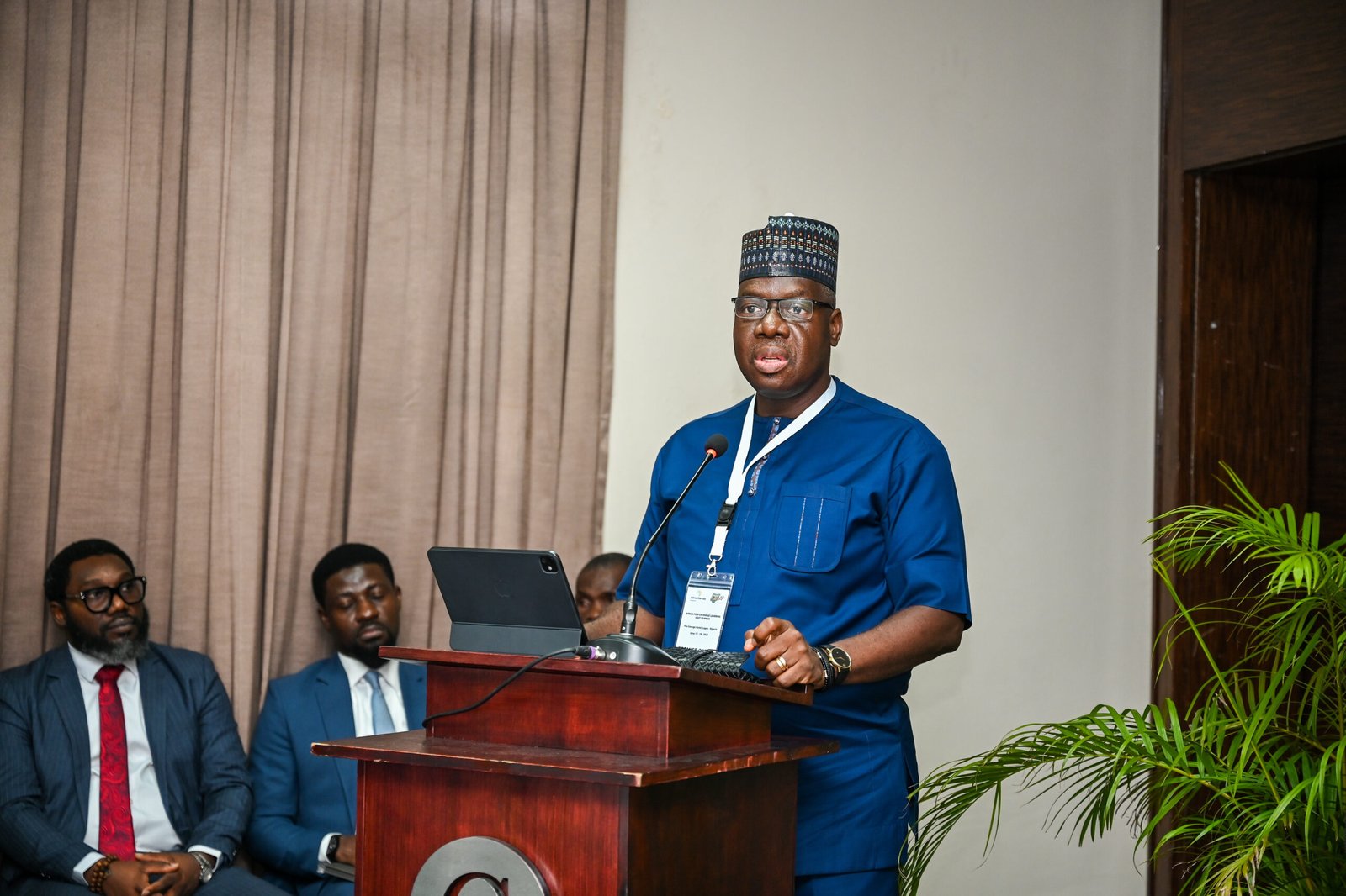 Premier Oiwoh, Managing Director & CEO, NIBSS, delivering his speech at the Peer Learning Workshop Vis@-2045497782